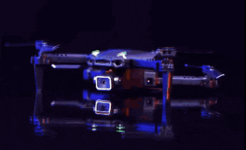 a blue and red drone with the word ninja on the side