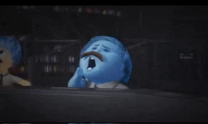 a cartoon character with a mustache is yawning while sitting in a car .