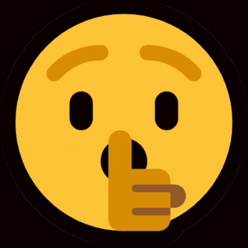 a yellow smiley face with a finger to its mouth