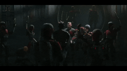 a group of robotic soldiers are standing in a dark room holding weapons .