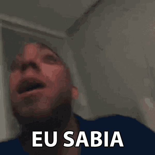 a man with a beard is making a funny face and saying eu sabia