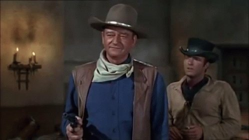 Western John Wayne GIF - Western John Wayne Gun Spinning GIFs