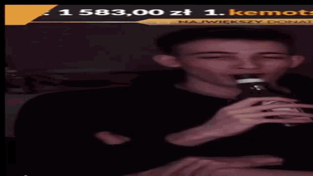 a man singing into a microphone with the number 1583.00 at the bottom