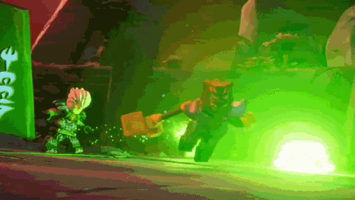 a cartoon character holding a hammer is surrounded by a green light .