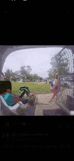 a screenshot of a video of a man holding a diamond axe