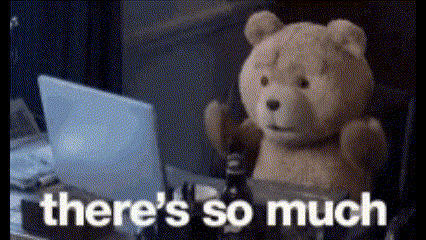 a teddy bear is sitting in front of a laptop with the words there 's so much written below it