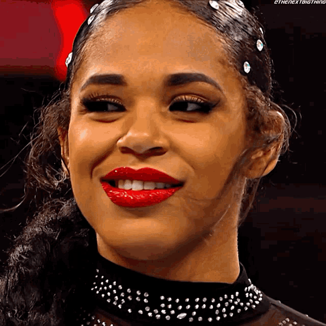 a close up of a woman 's face with the hashtag thenextbig thing
