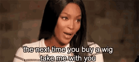 a woman is talking about buying a wig next time you buy a wig take me with you .