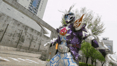 a person in a purple and white costume with the letter c on it