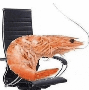 a large shrimp is sitting on top of an office chair .