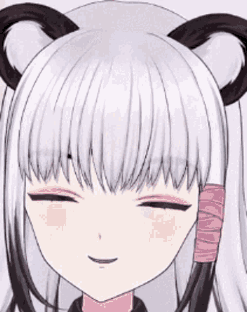 a girl with white hair and black ears is smiling