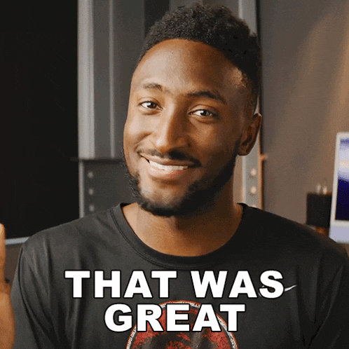 a man wearing a black shirt that says that was great on it