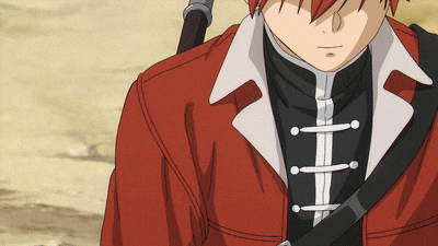 a close up of a person wearing a red and black jacket