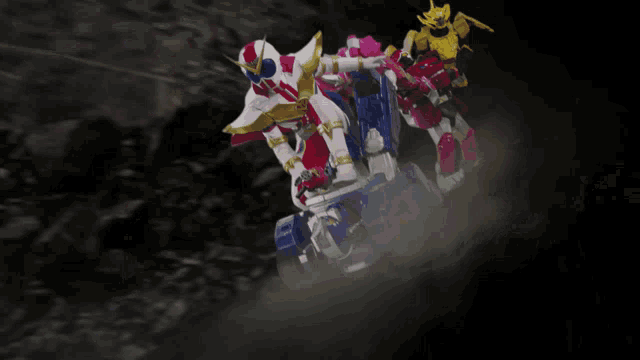 a group of robots are flying through the air in a dark room