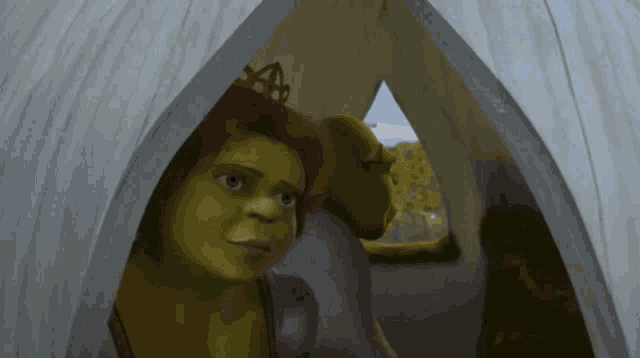 shrek and fiona looking out of a tent with shrek wearing a crown