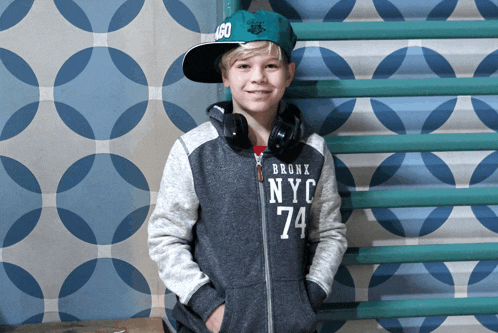 a boy wearing a bronx nyc 74 jacket