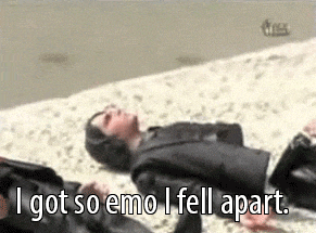 a man in a suit is laying on the floor and says i got so emo i fell apart .