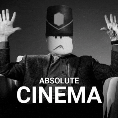 a man with a bucket on his head is sitting in a chair with the words absolute cinema below him