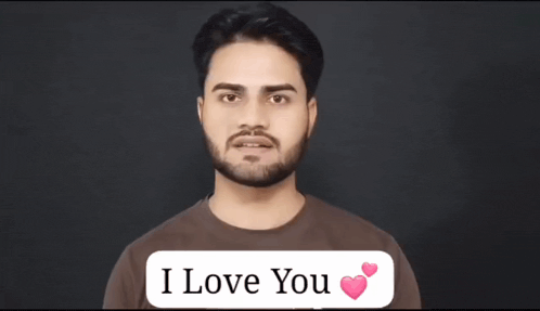 a man with a beard says i love you in a speech bubble