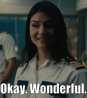 a woman in a military uniform is smiling and says okay wonderful
