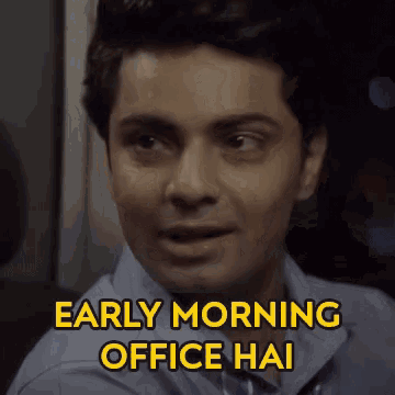 a close up of a man 's face with the words " early morning office hai " above him