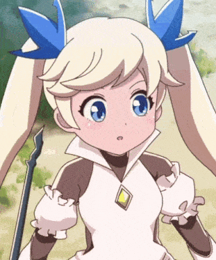 a girl with blonde hair and blue bows on her ears