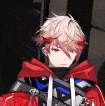 a boy with red horns on his head is wearing a red hoodie