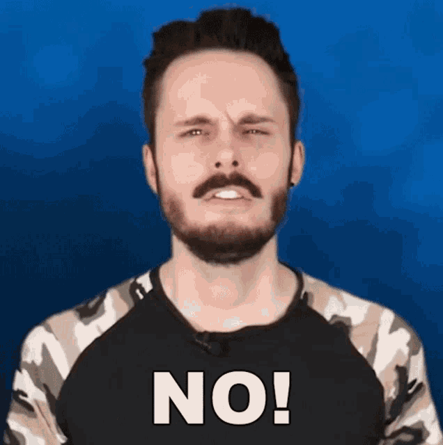 a man with a beard and mustache is wearing a shirt that says no