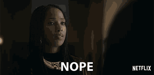 a woman says nope in front of a netflix ad