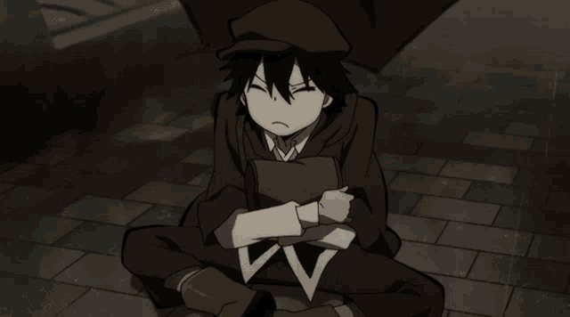 a cartoon character is sitting on the ground with a book in his hands