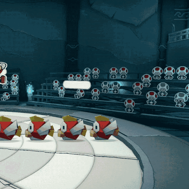 a bunch of toads are lined up in a room