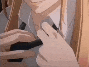 a close up of a person wearing a tie and a shirt .