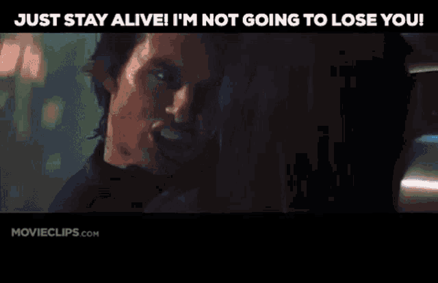 a man is screaming at a woman and the words just stay alive i 'm not going to lose you