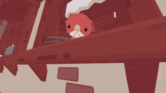 a purple glove with a purple button on it reaches out to a red bird