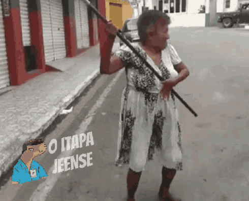 a woman holding a stick with the words o itapa jeense on the bottom right