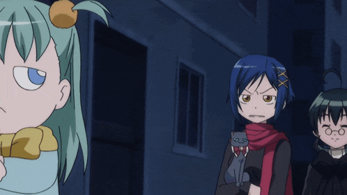 a girl with blue hair is standing next to a girl with green hair