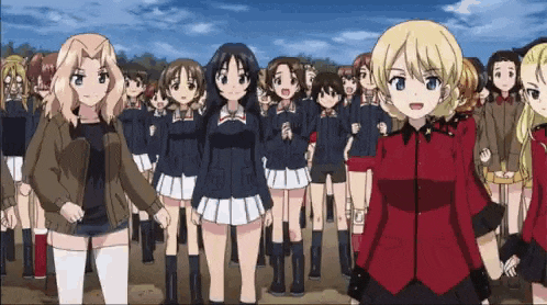a group of anime girls are standing next to each other .