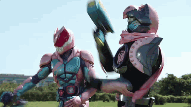 a man in a pink and blue costume is holding a gun in his hand