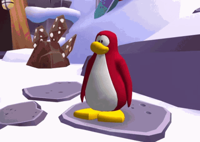 a red and white penguin standing on a rock