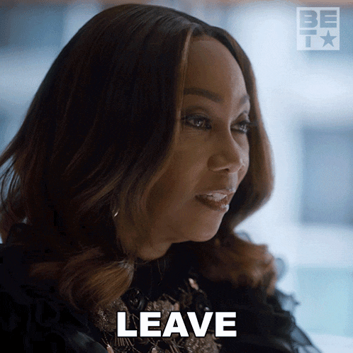 a woman in a black dress says leave