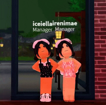 two girls are standing in front of a window with the name iceellairenimae manager manager on it