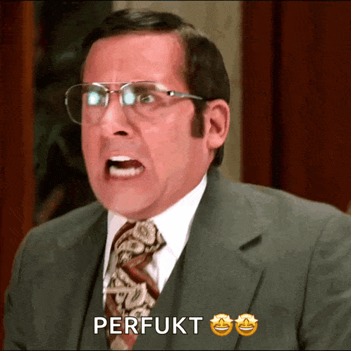 a man in a suit and tie is making a funny face and says perfukt