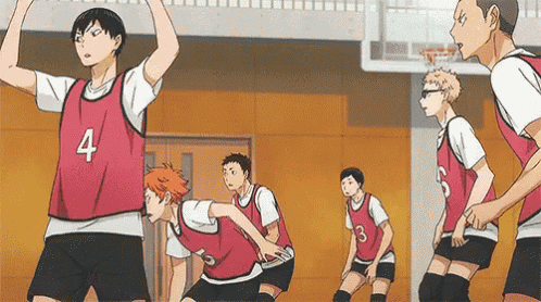 a group of basketball players are playing a game of basketball on a court .