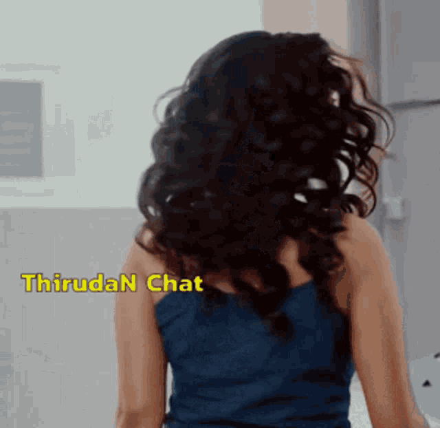 a woman 's back is shown with the words thiruda n chat below her