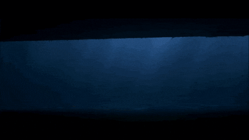 the sun is shining through the water and casting a shadow