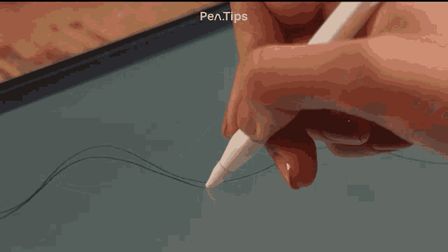 a person is using a pen to draw a line on a screen with the words pen tips above them