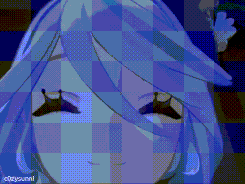 a close up of a girl 's face with blue hair and black eyelashes .