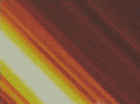 a close up of a light coming out of a hole in the wall