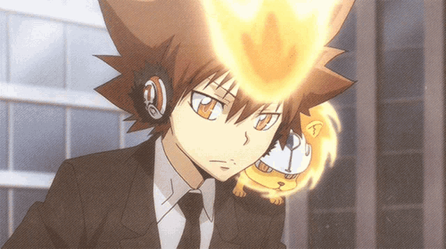 a man in a suit and tie has a fireball coming out of his forehead