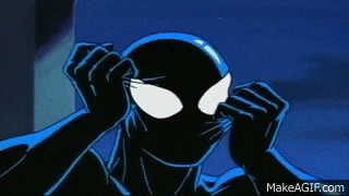 a close up of a cartoon character in a black and blue suit covering his face with his hands .